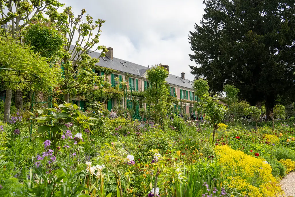 The Clos Normand flower garden almost hiding the house